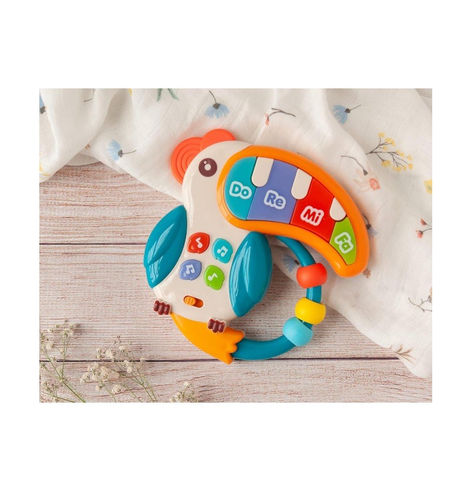 Muzikinis žaislas fortepijonas Woopie Baby Teether Pelikan