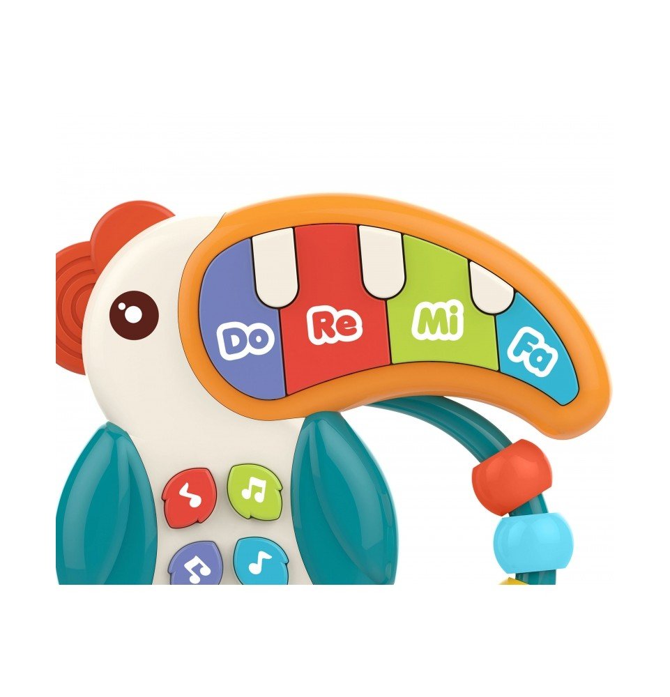 Muzikinis žaislas fortepijonas Woopie Baby Teether Pelikan